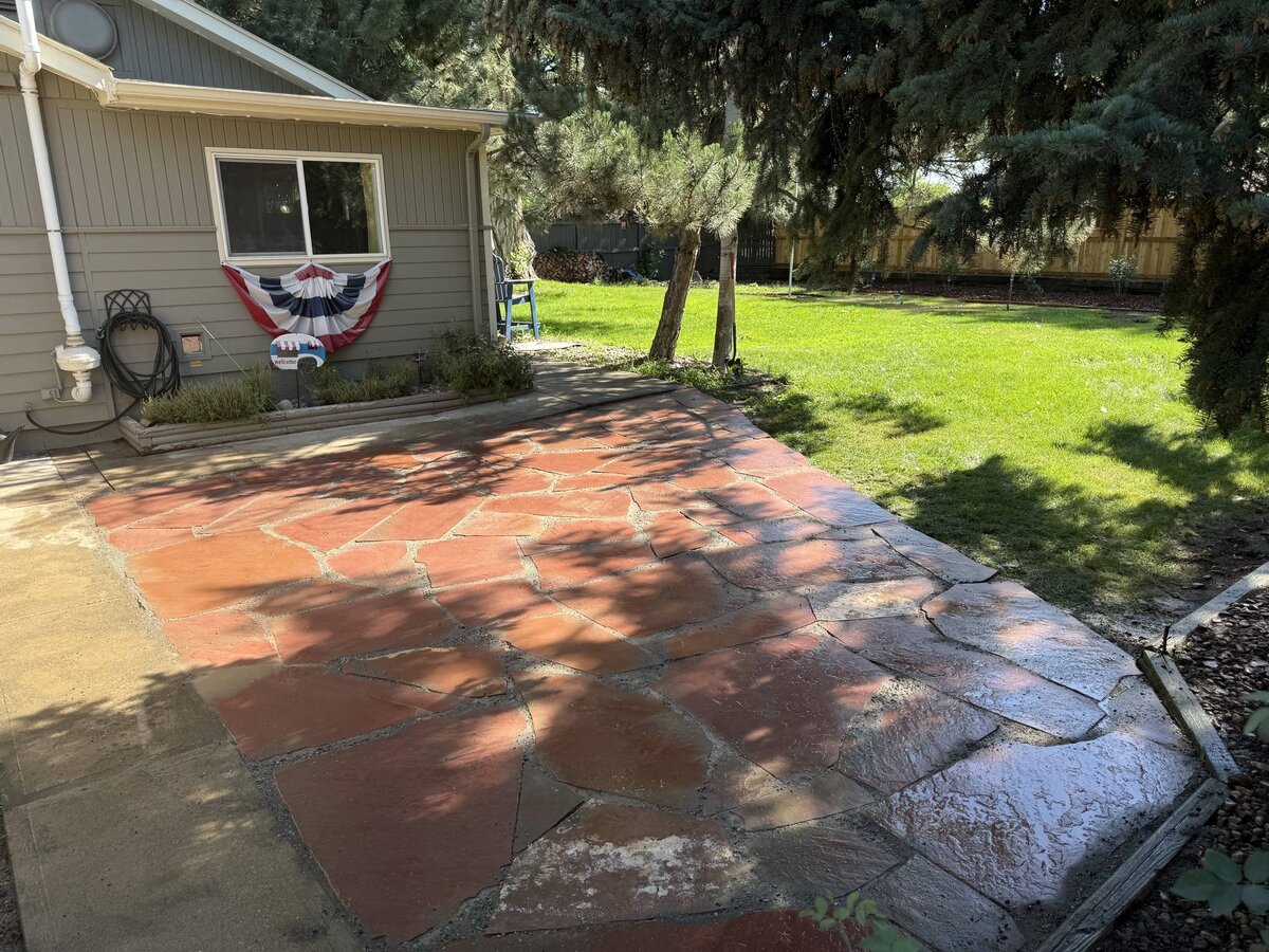 Flagstone patio landscaping project by LO.CO