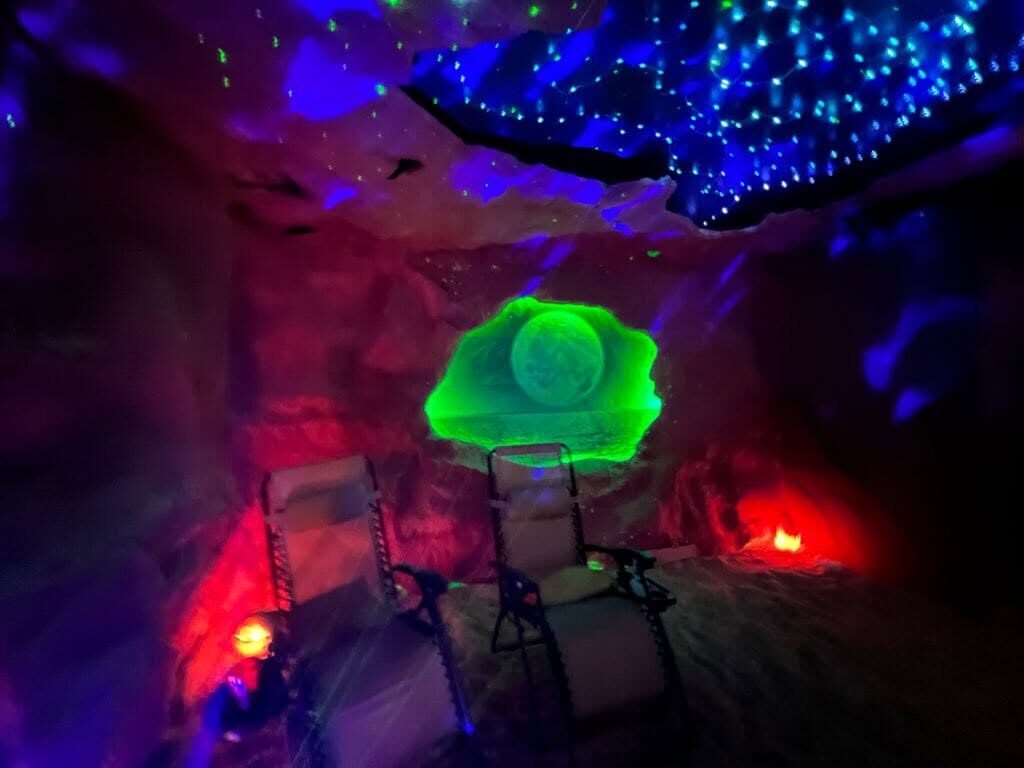 Inside the Mon Ami salt cave — a glowing portal carved into Himalayan salt rock