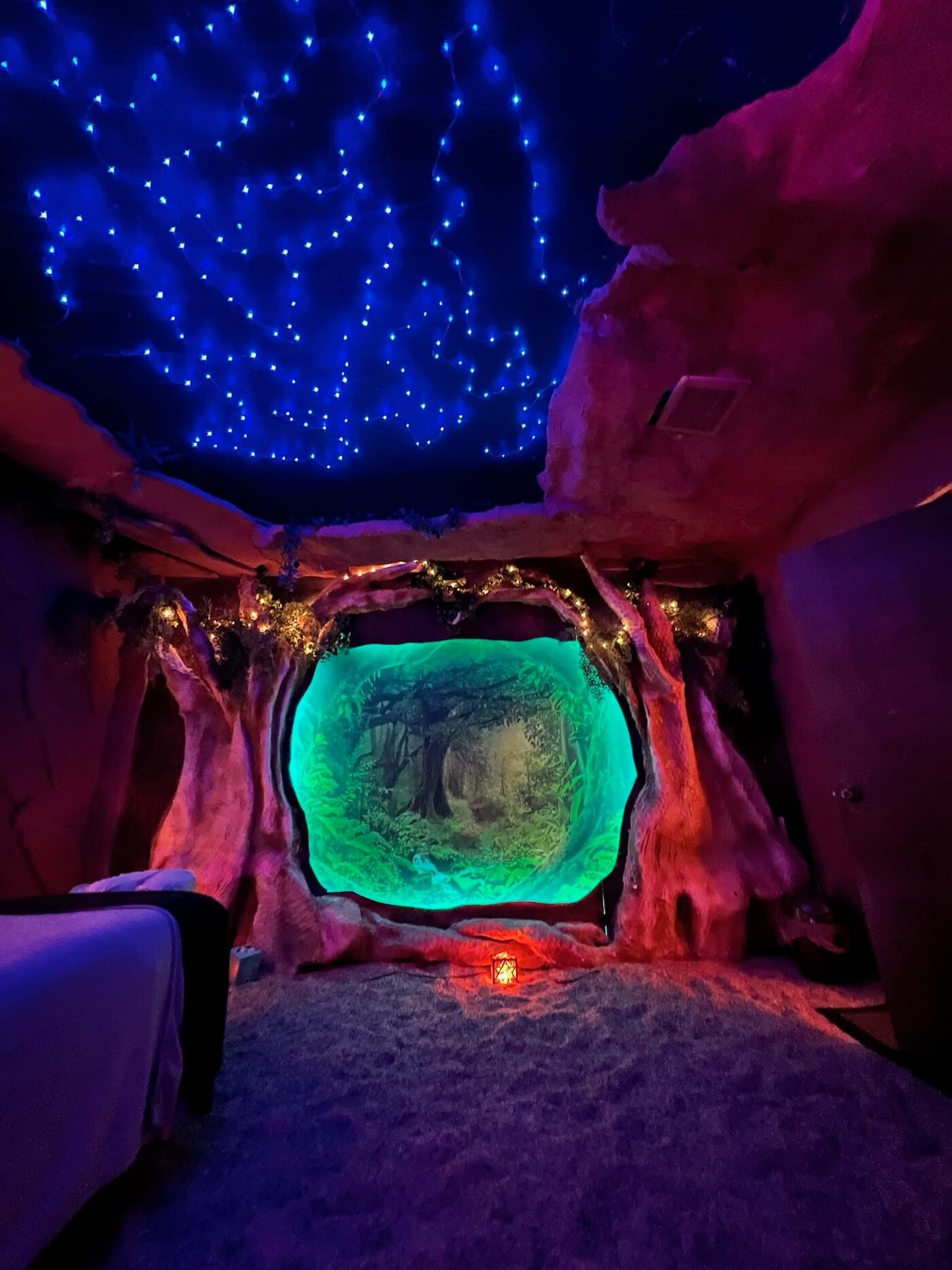 The glowing forest portal and starlit ceiling inside the salt cave